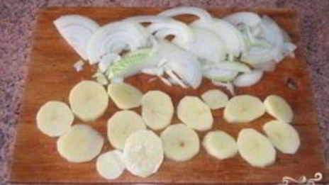 мясо по-французски с картофелем и помидорами