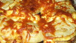 Свинина по-французски с сыром и луком