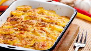 Запеченный картофель в сливках и чесноке