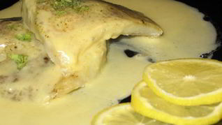 Рыба под белым соусом