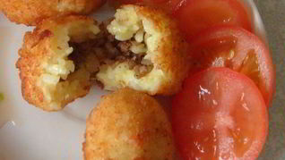 Сицилийские аранчини — рисовые шарики с фаршем