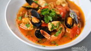 Жаркое с рыбой и морепродуктами в томатном соусе