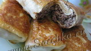 Блинчики, фаршированные мясом и чесноком