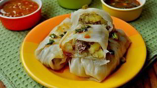 Капустные конвертики со свининой и овощами