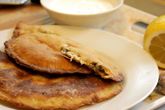 Чебурек с начинкой из баранины и брынзы с чесночным соусом
