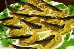 Фаршированные яйца со шпротами